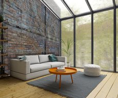 papier peint briques rouges peintes dans un salon