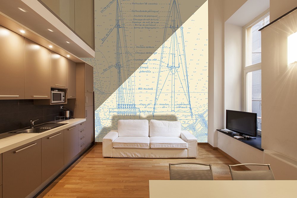 papier peint Sur la Hune, bleu sur fond écru dans un séjour